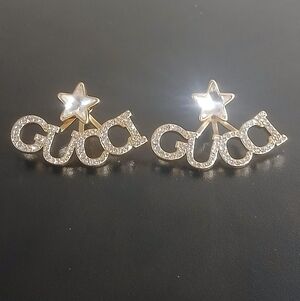 Gucci Gold and Silver Logo Star Earrings